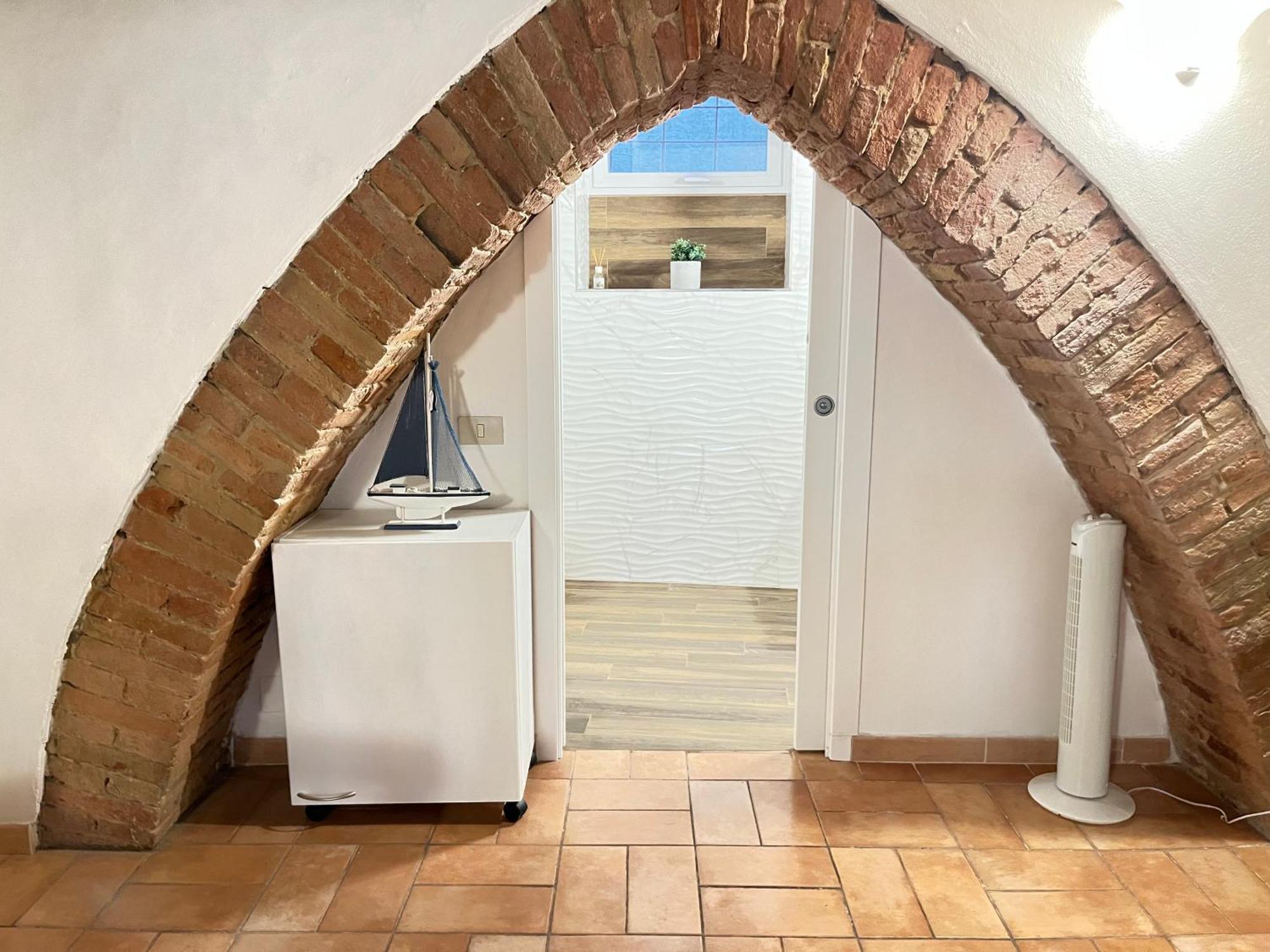 Gli Archi Nel Cuore Di Siena Bagian luar foto